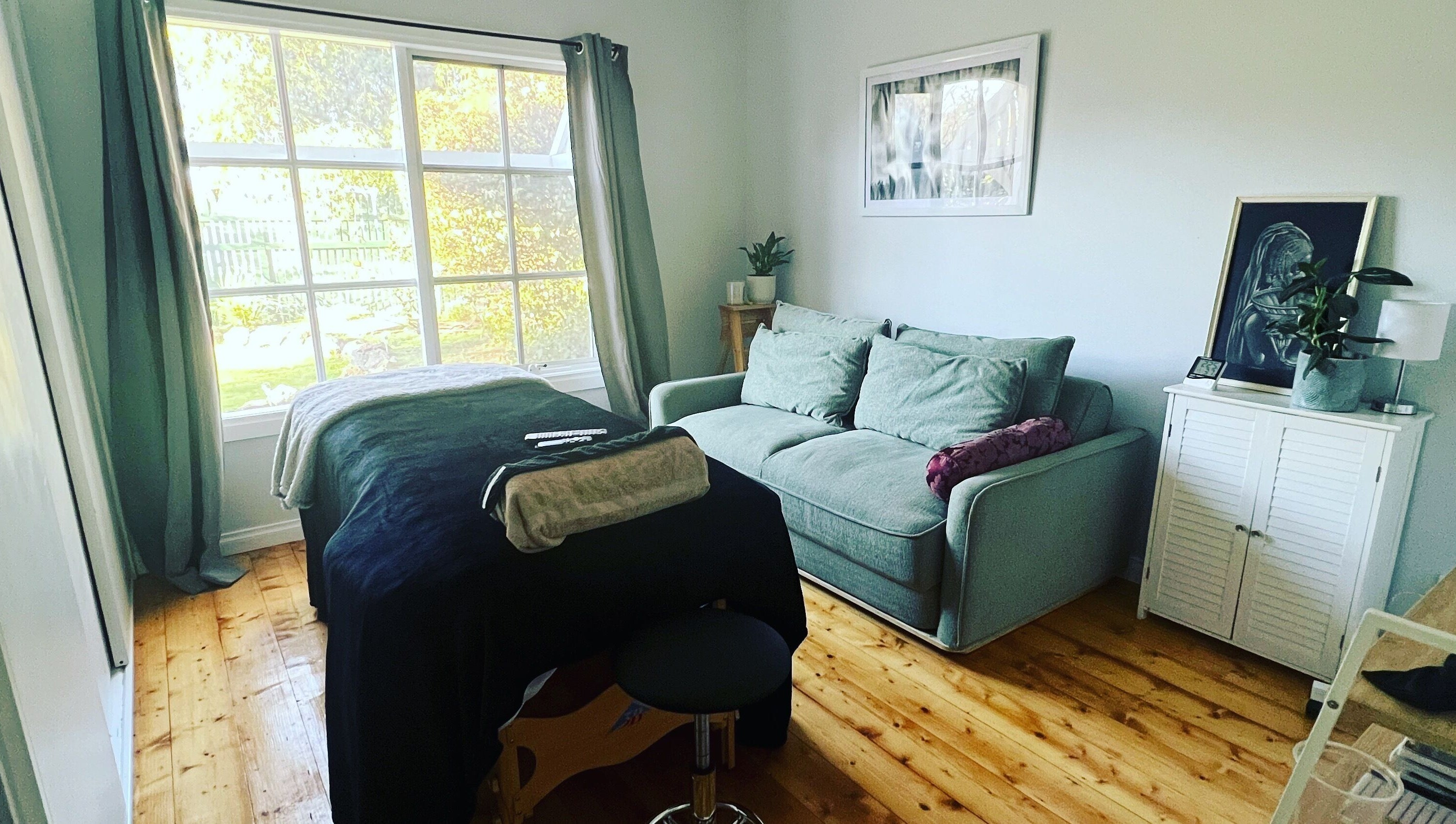 Tranquil treatment room with couch and massage bed at Beautify Brows & Lashes, Hamilton Valley, New South Wales, AU.