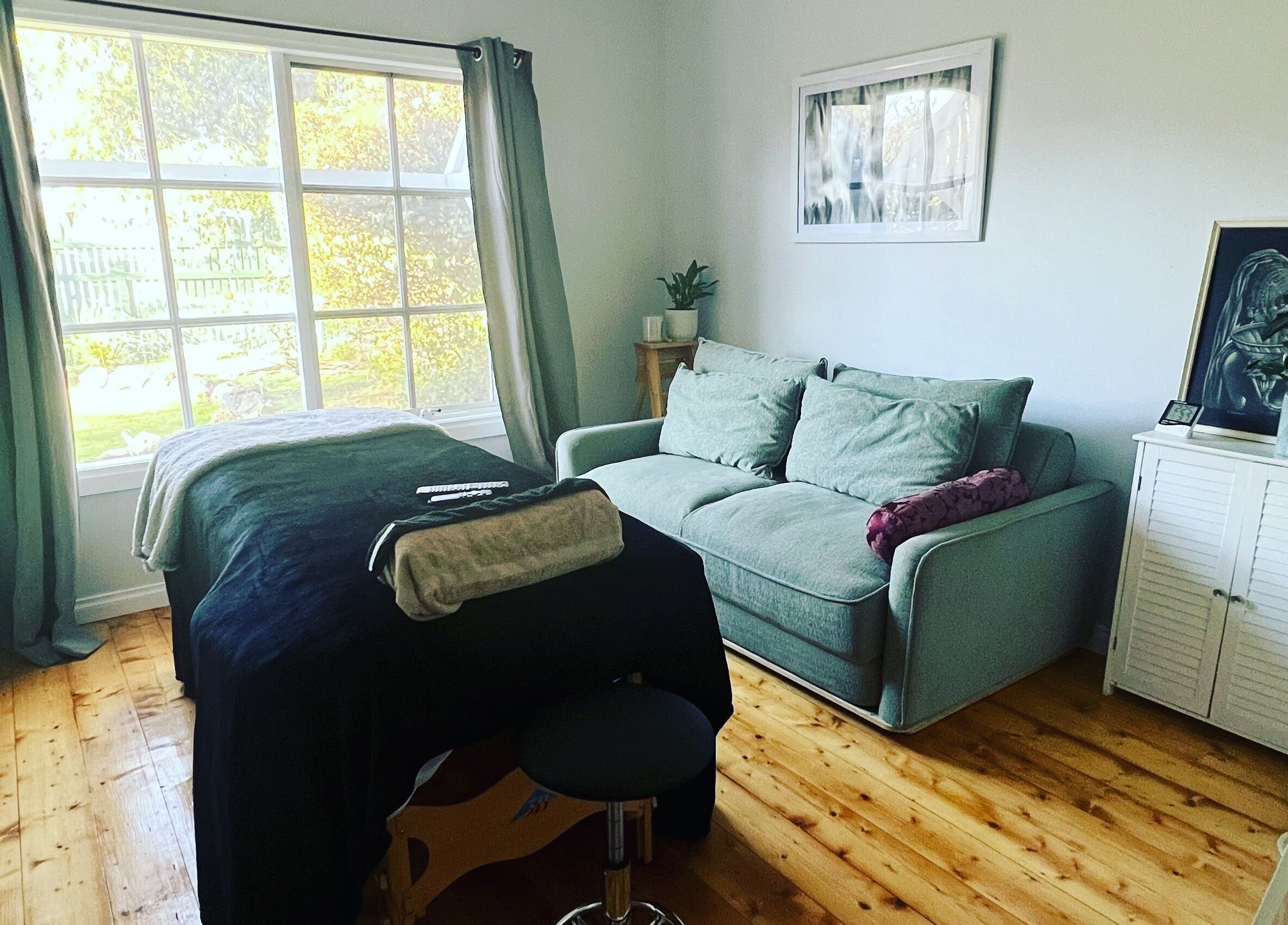 Tranquil treatment room with couch and massage bed at Beautify Brows & Lashes, Hamilton Valley, New South Wales, AU.