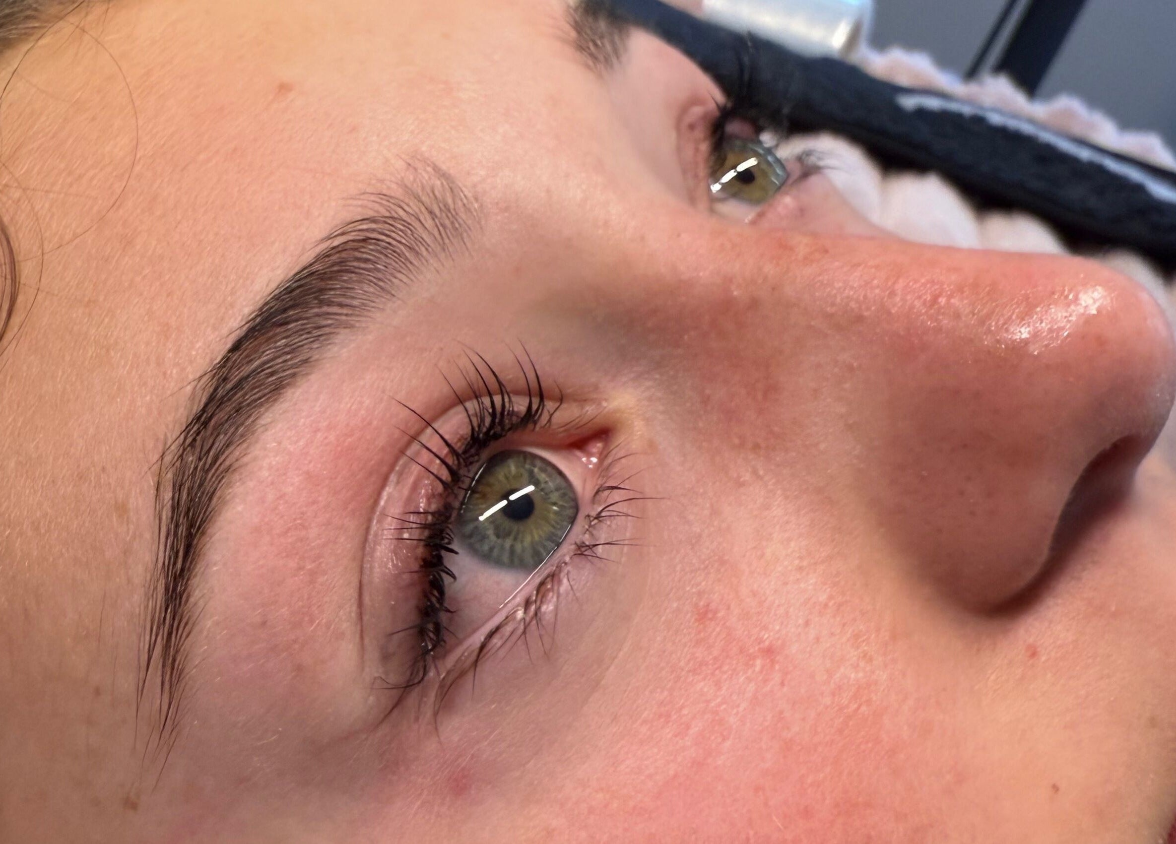 Close-up of expertly groomed brows and lashes at Beautify Brows & Lashes, Hamilton Valley, New South Wales, AU.