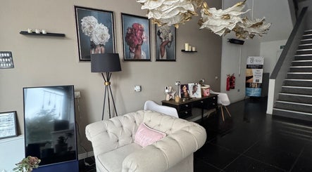Elegant lounge area at Beauty Atelier NM in Hull, England, GB featuring chic decor and modern art.