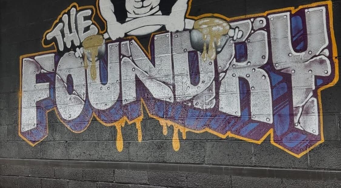 Colorful graffiti art at chubby_charles_services in Paisley, Scotland, GB, showcasing urban creativity.