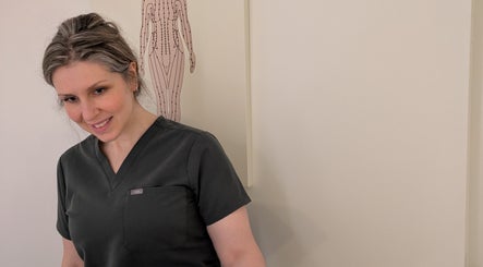 Therapist at Holistic Therapies by Camille, Cardiff, Wales, GB, offering wellness treatments.