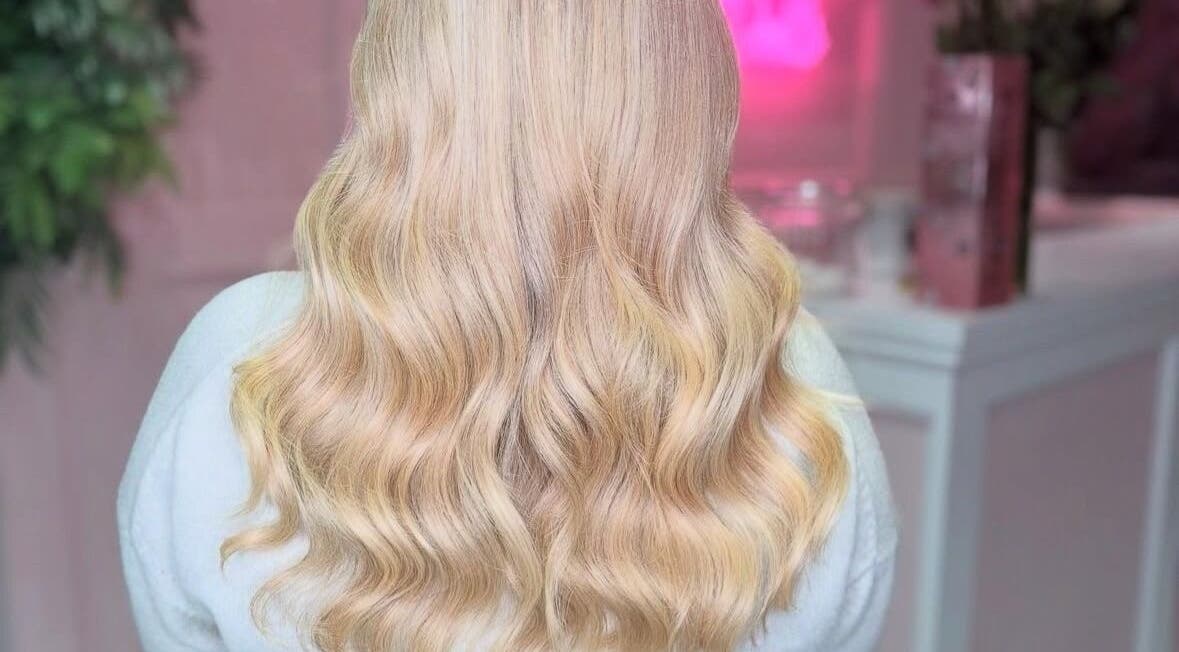 Elegant blonde waves styled at Hair By CM, Newcastle upon Tyne, England, GB.