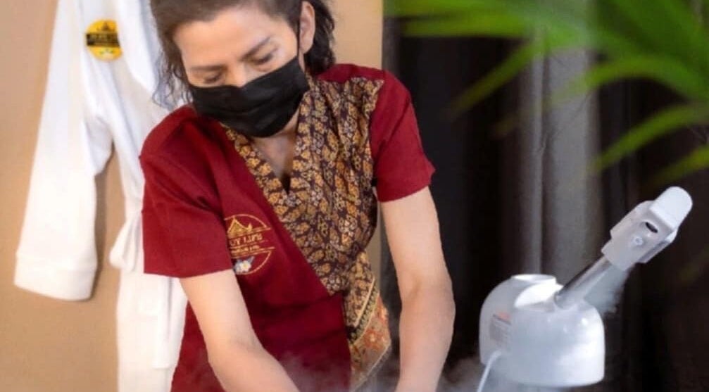 Therapist at In Joy Life Thai Massage and Spa (Ravenhall), Melbourne, Victoria, AU, providing a relaxing massage.