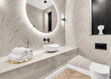 Elegant bathroom at Suburban Glow Wilmslow Lashes and Brows, Wilmslow, England, GB, featuring a sleek round mirror.