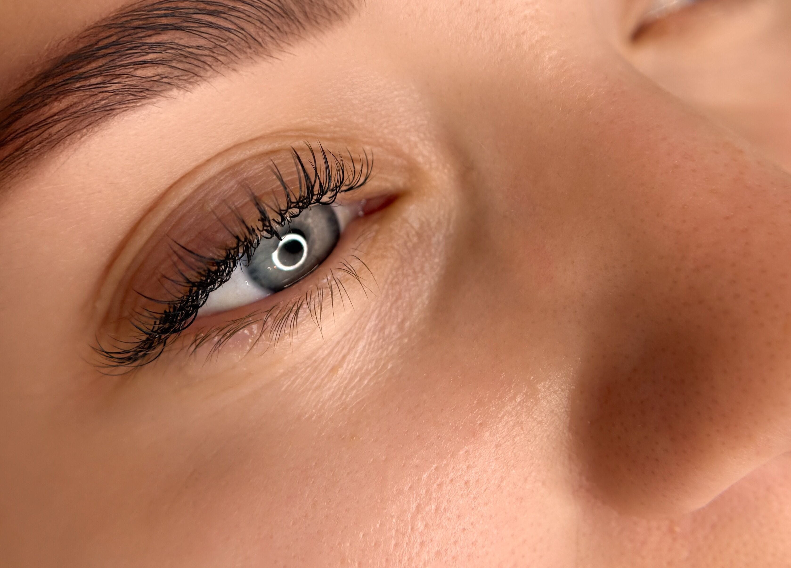 Close-up of perfectly groomed eyebrow and lashes at Suburban Glow, Wilmslow, England, GB.