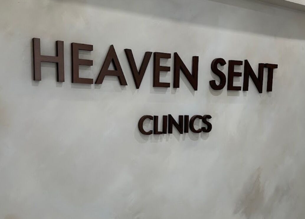 Suburban Glow venue entrance signage in Wilmslow, England, GB displays 'Heaven Sent Clinics'.