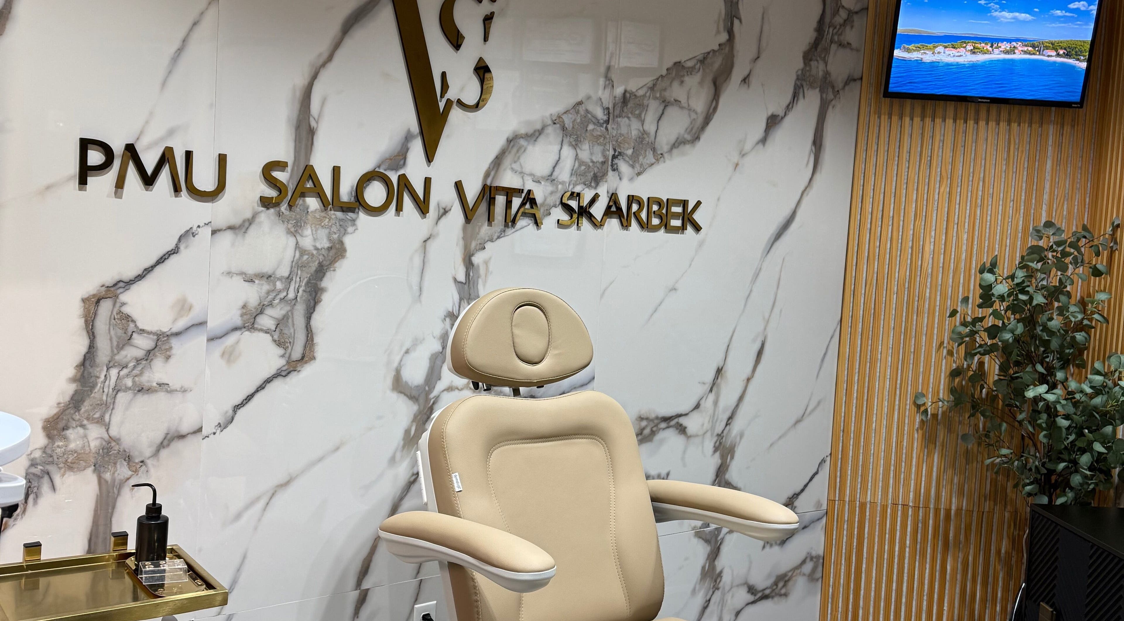 Luxurious seating at PMU Salon VS, Dallas, Texas, US showcases a chic, modern aesthetic.