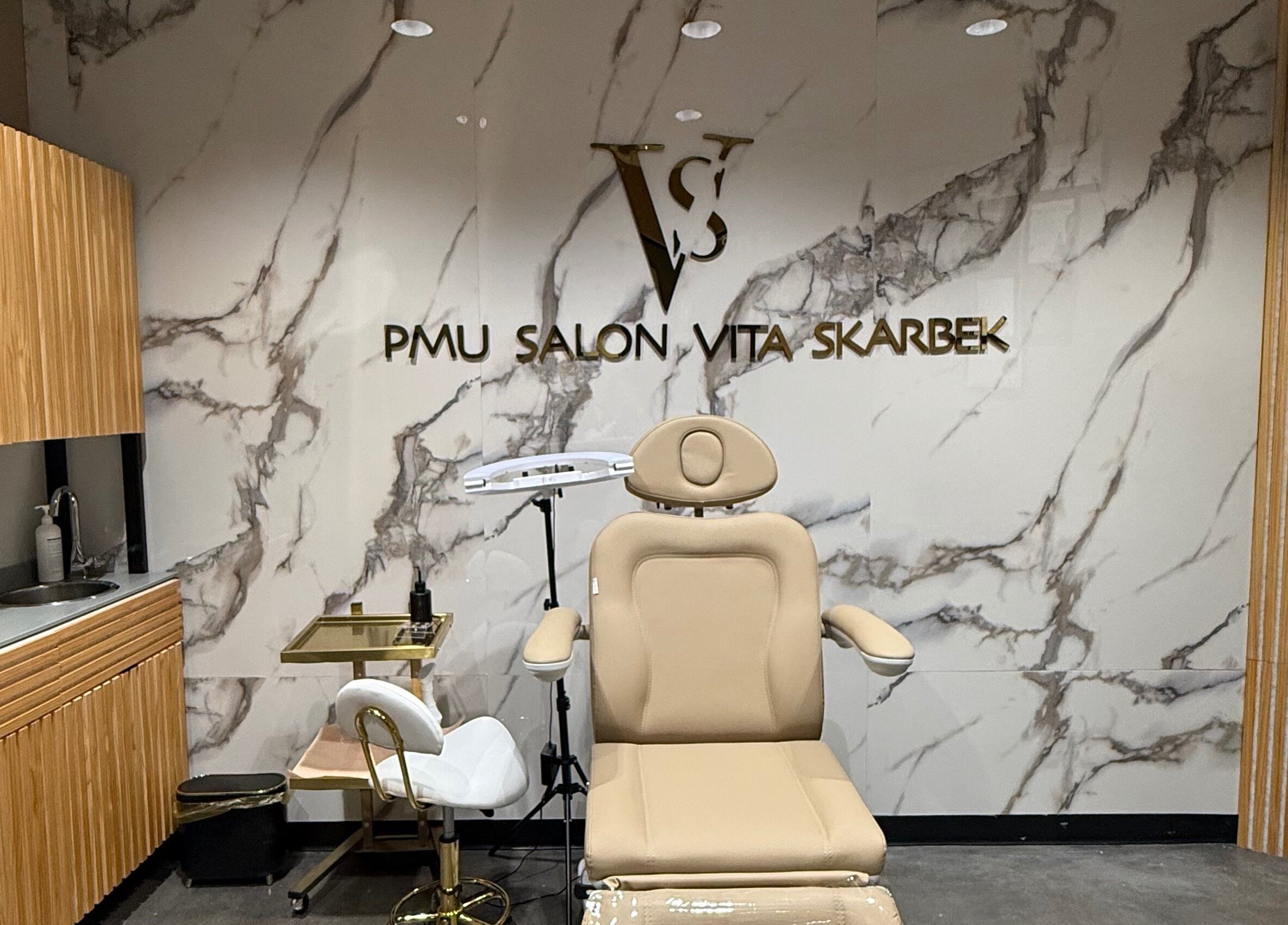 Elegant treatment room at PMU Salon VS in Dallas, Texas, US with modern furnishings and luxurious decor.