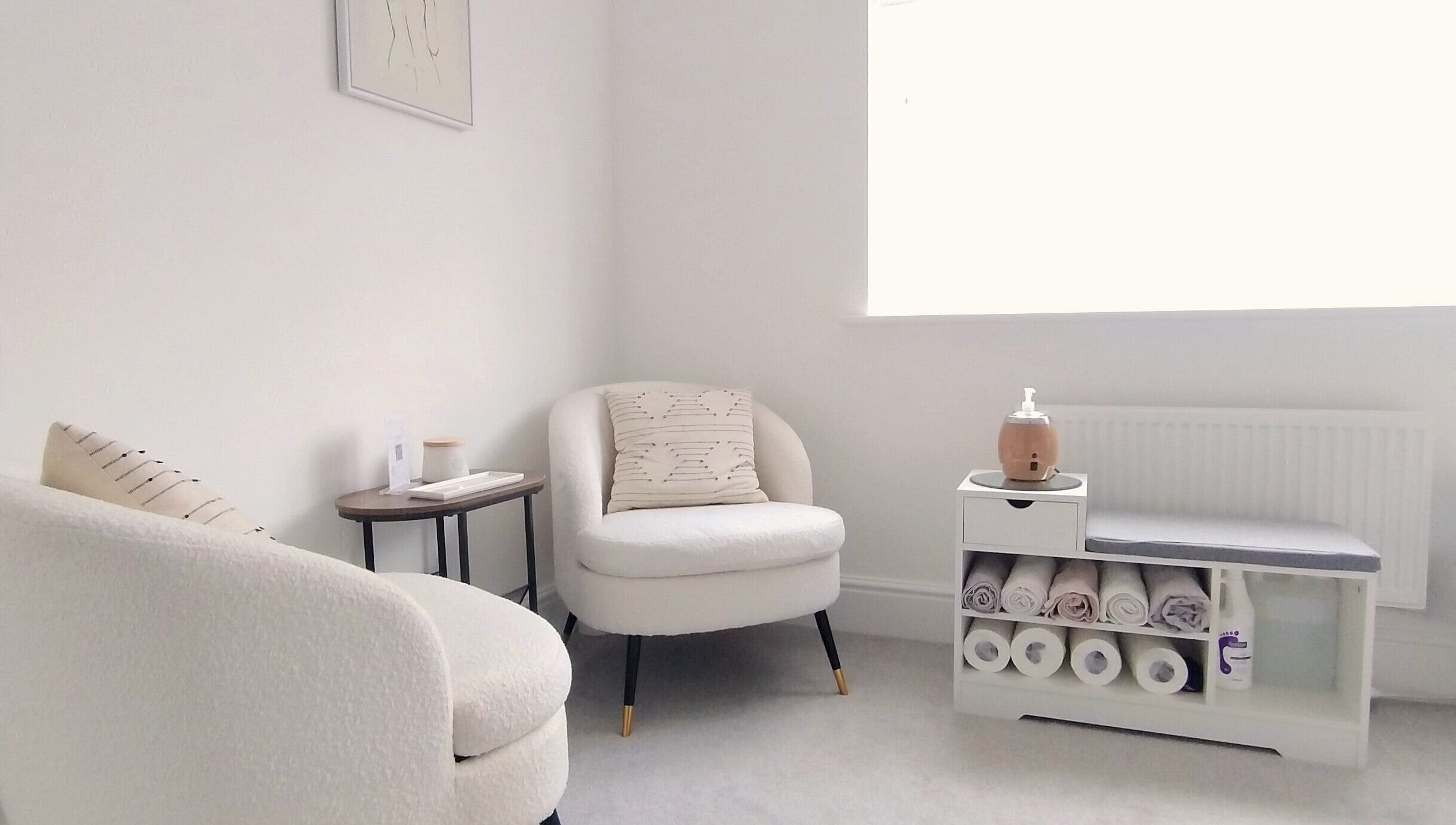 Cozy seating area at Meadow Vale Beauty in Cottingham, England, GB, showcasing minimalist design and soft textures.