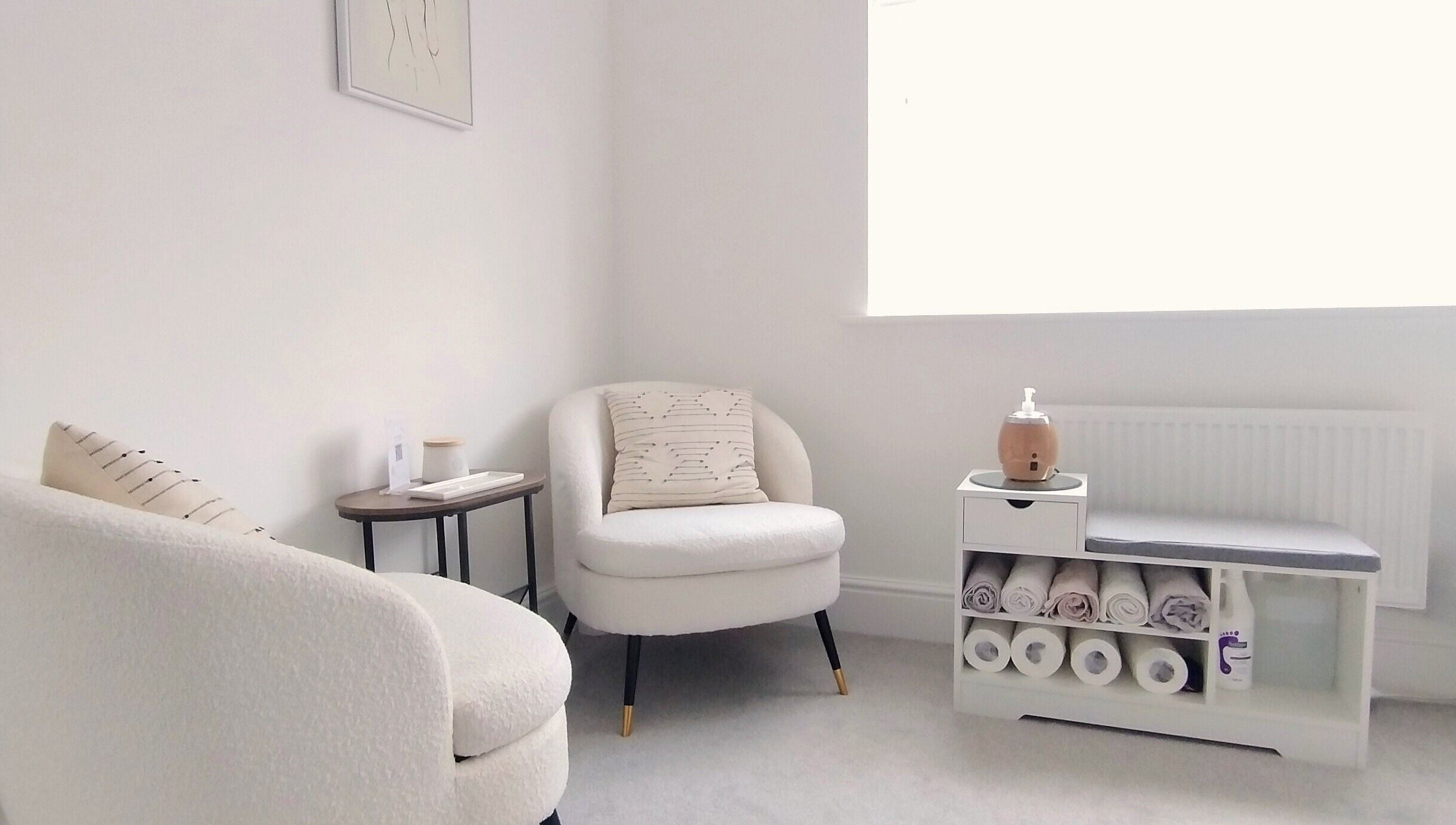 Cozy seating area at Meadow Vale Beauty in Cottingham, England, GB, showcasing minimalist design and soft textures.