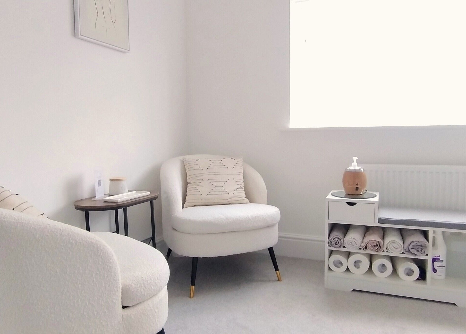 Cozy seating area at Meadow Vale Beauty in Cottingham, England, GB, showcasing minimalist design and soft textures.