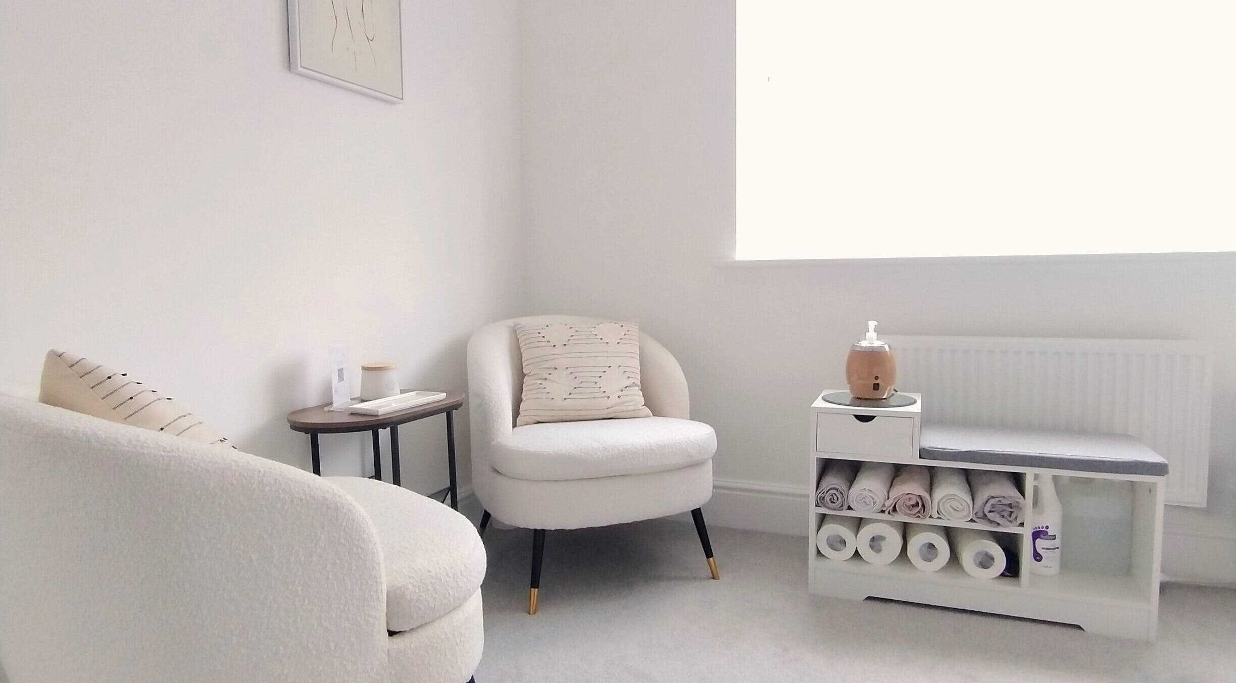 Cozy seating area at Meadow Vale Beauty in Cottingham, England, GB, showcasing minimalist design and soft textures.