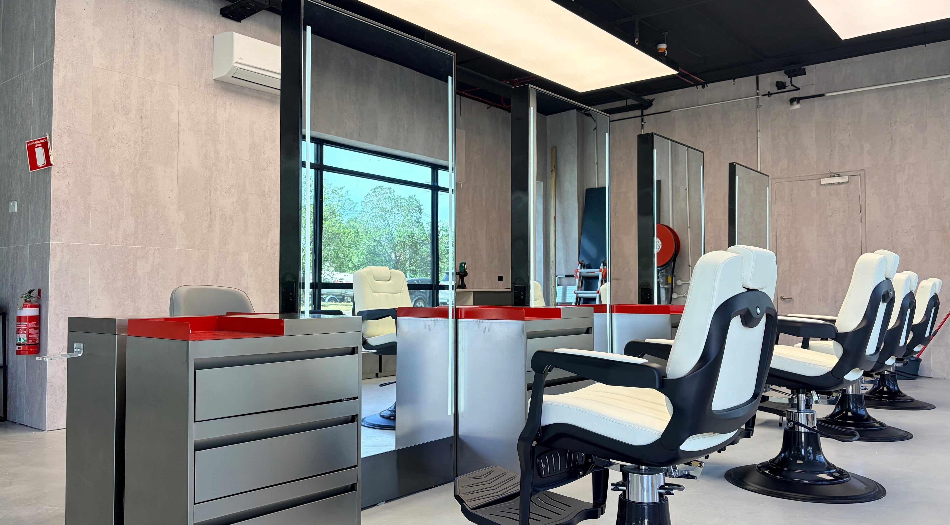 Modern barber chairs at Bspoke barbershop Malvern, Melbourne, Victoria, AU with sleek design.