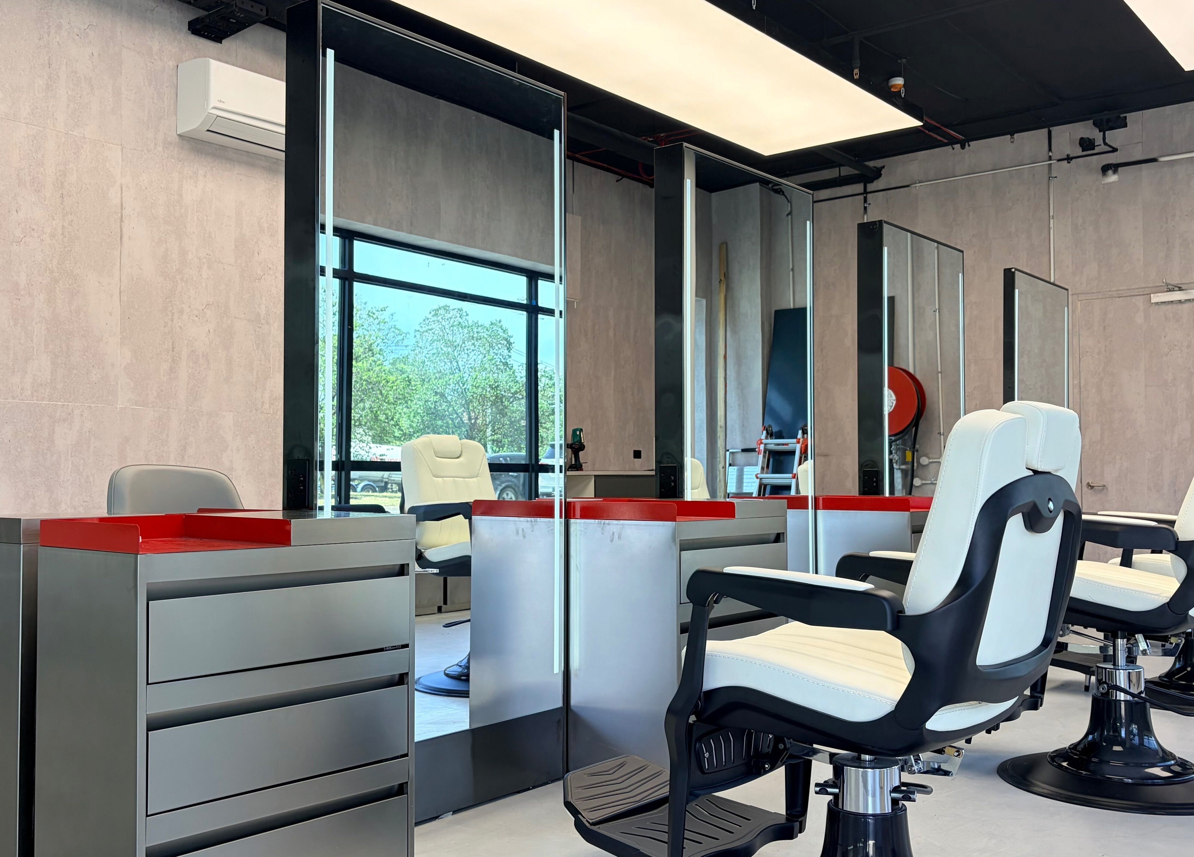 Modern barber chairs and mirrors at Bspoke Barbershop Malvern, Melbourne, Victoria, AU.