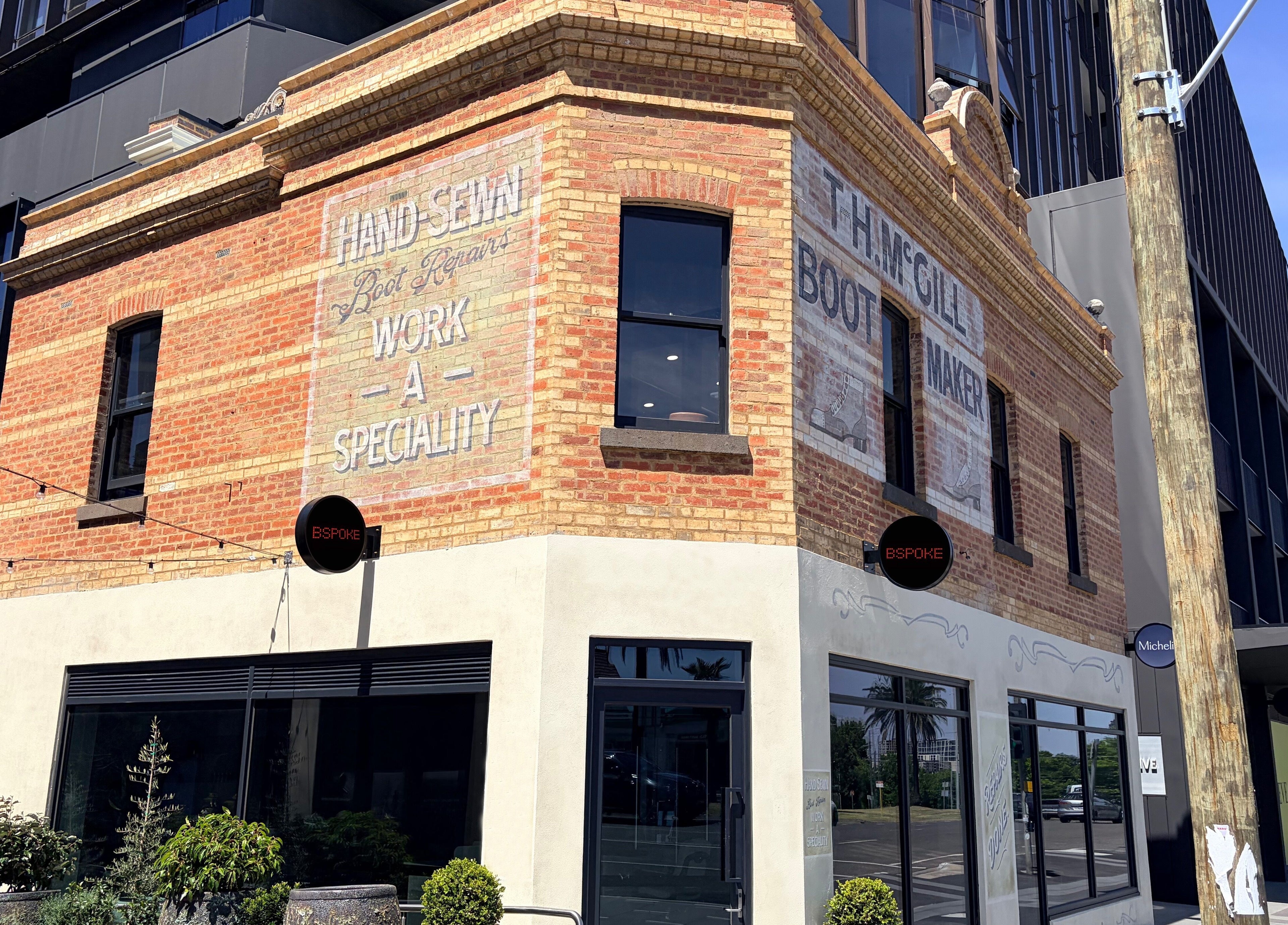 Historic brick facade of Bspoke Barbershop Malvern, Melbourne, Victoria, AU, showcasing vintage charm.