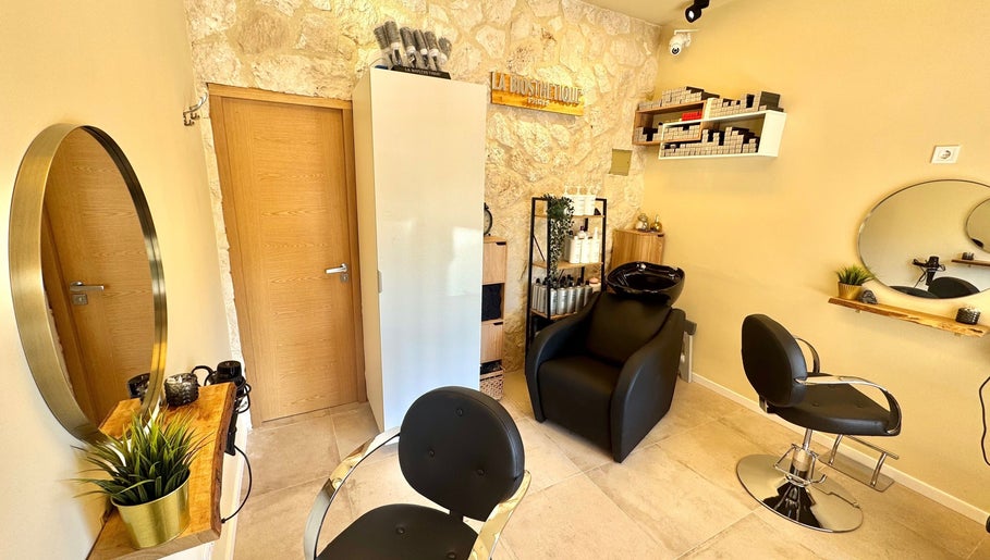 Elegant styling chairs and decor at Modo Hair Salon, Peguera, Illes Balears, ES.