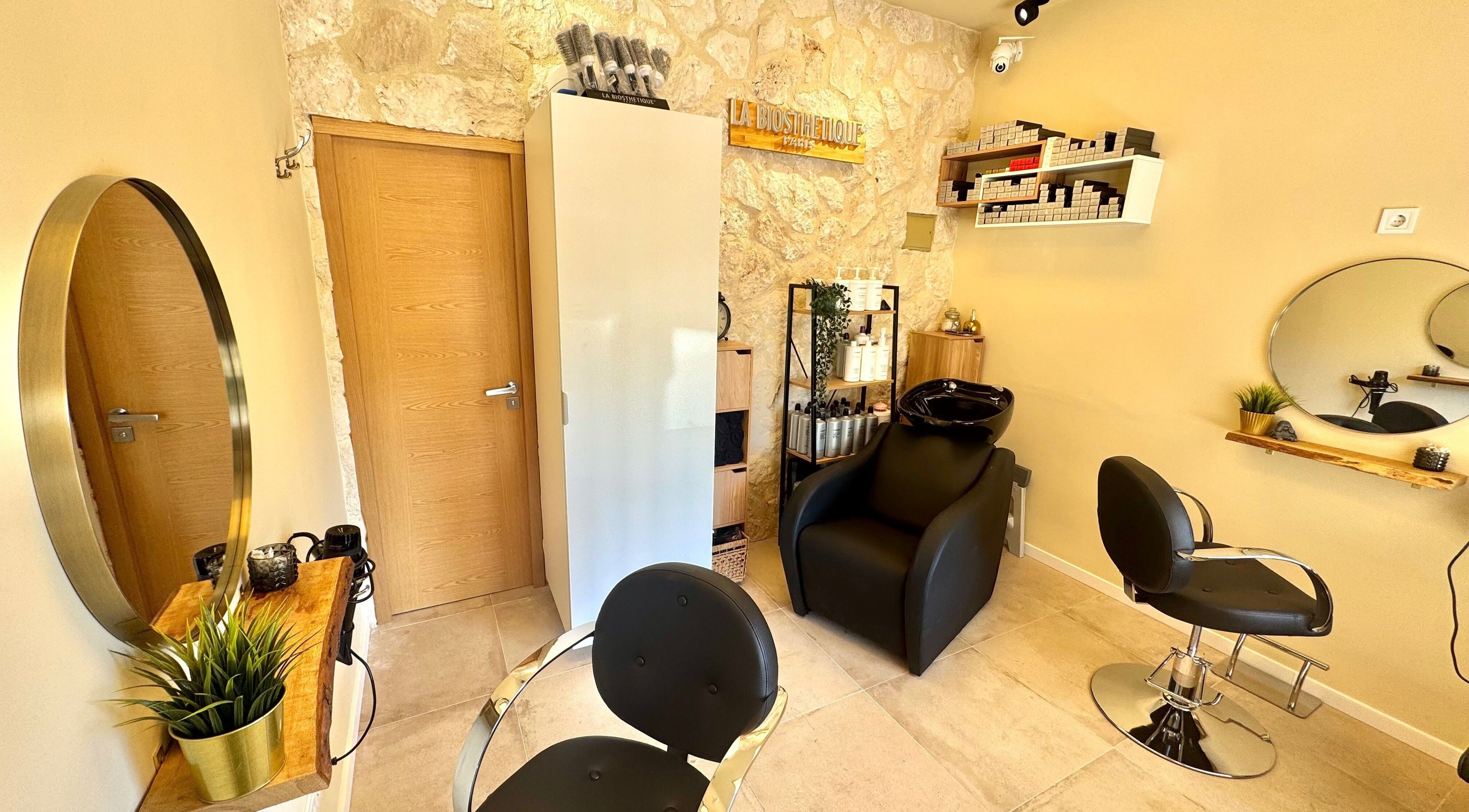 Elegant styling chairs and decor at Modo Hair Salon, Peguera, Illes Balears, ES.