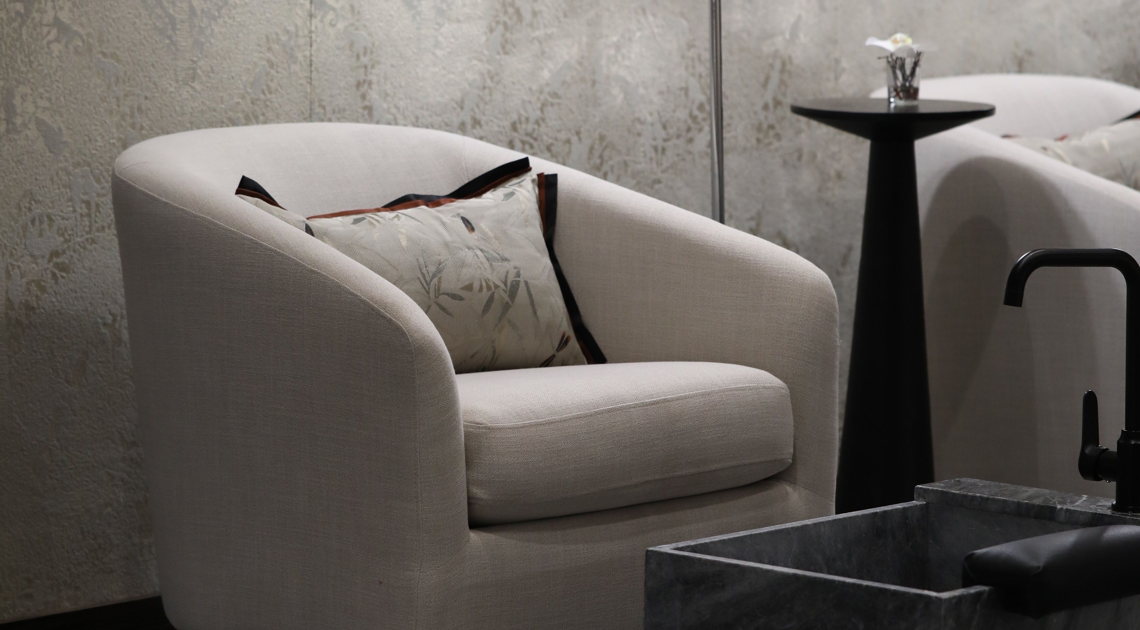 Comfortable lounge chair at Mahogany Nail Spa, Riyadh, Riyadh Province, SA offering elegance and relaxation.