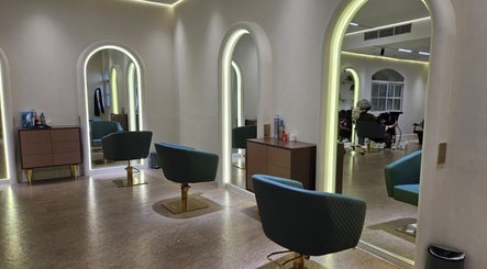 Modern salon interior with chic mirrors and chairs at By H Beauty Ladies Salon, Dubai, Dubai, AE.
