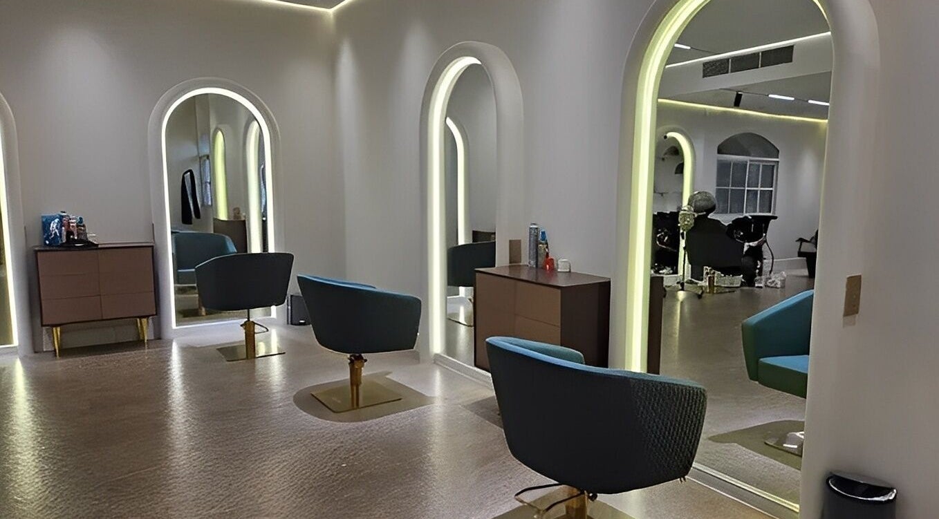 Modern styling chairs and mirrors at By H Beauty Ladies Salon, Dubai, Dubai, AE, offering luxurious beauty services.