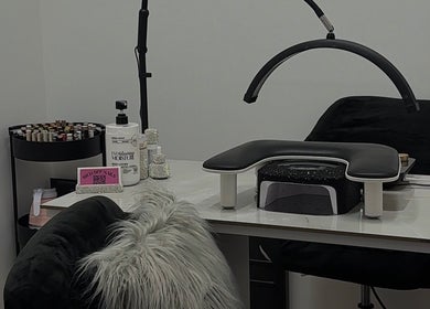 Modern nail art station at RichOffNailsFL Nail Artistry in Orlando, Florida, US with sleek decor and tools.