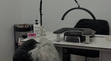 Modern nail art station at RichOffNailsFL Nail Artistry in Orlando, Florida, US with sleek decor and tools.
