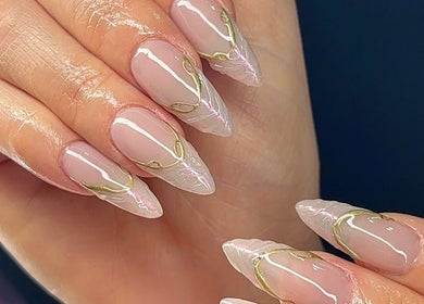 Elegant gold-accented nail design at RichOffNailsFL Nail Artistry, Orlando, Florida, US.