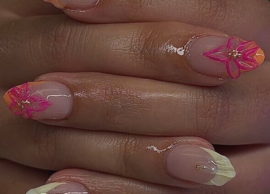 Floral nail art design at RichOffNailsFL Nail Artistry in Orlando, Florida, US, showcasing intricate details.