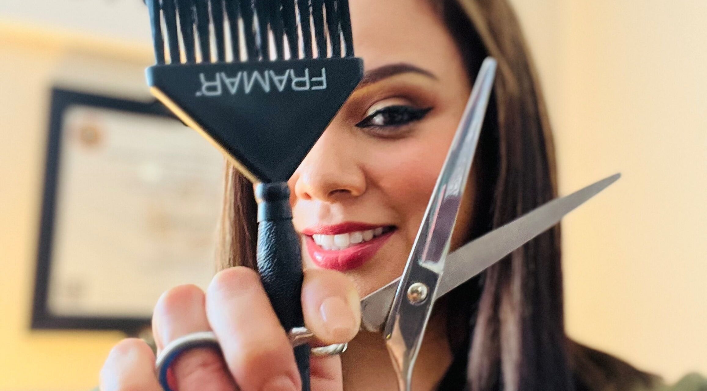 Hairstylist BrendaG showing scissors and comb in Bradenton, Florida, US.