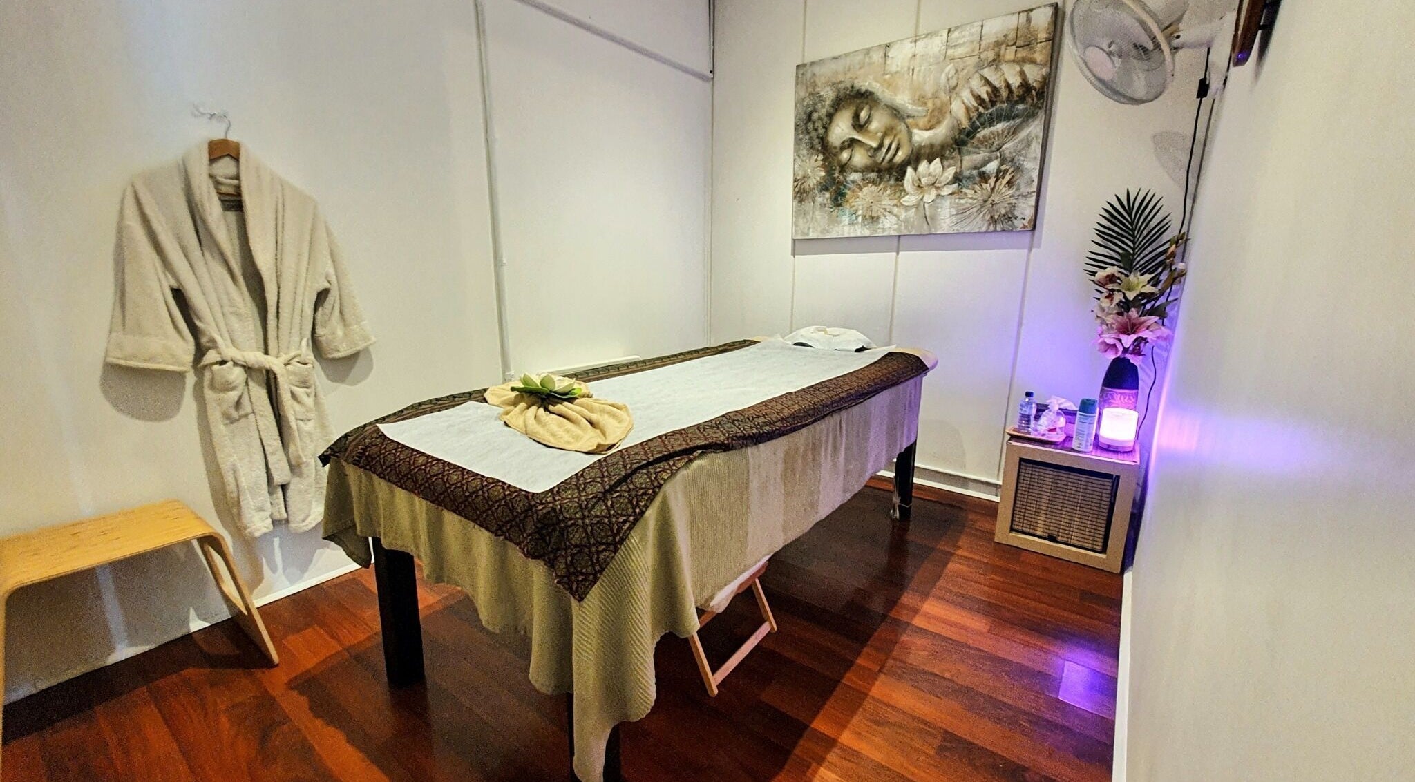 Tranquil massage room at Leelawadee Thai Massage & Beauty, Melbourne, Victoria, AU. Warm lighting and calming decor.