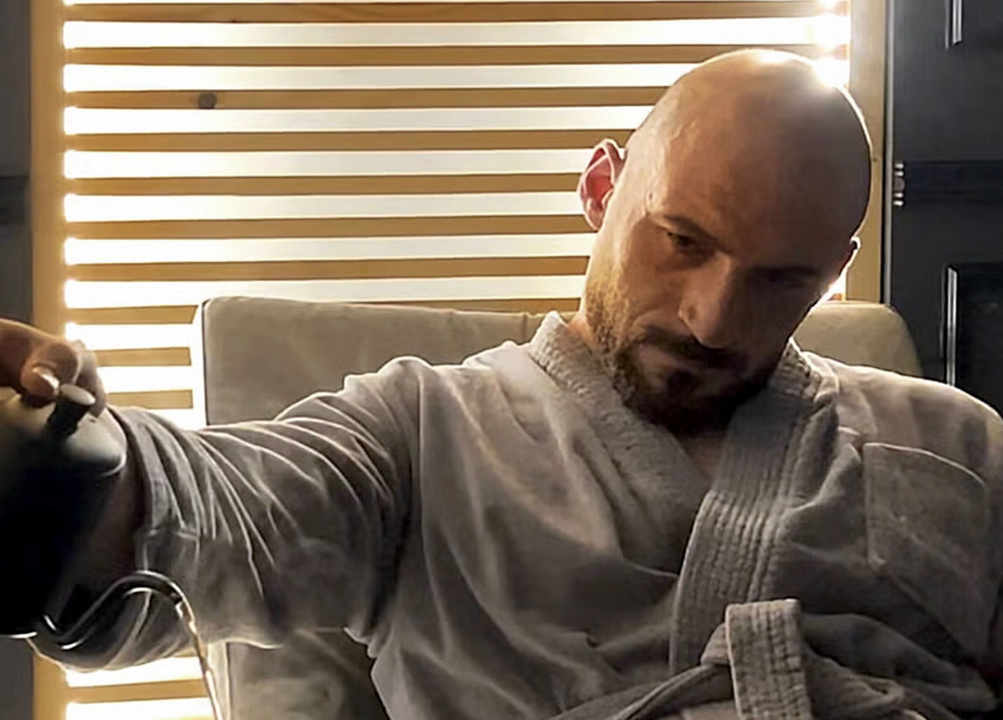 Man relaxing in robe at Hammam Al Andalus Gents Salon and Spa, Dubai, Dubai, AE.