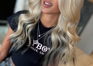 Stylish blonde hair with dark roots at Coiffure in Melbourne, Victoria, AU.