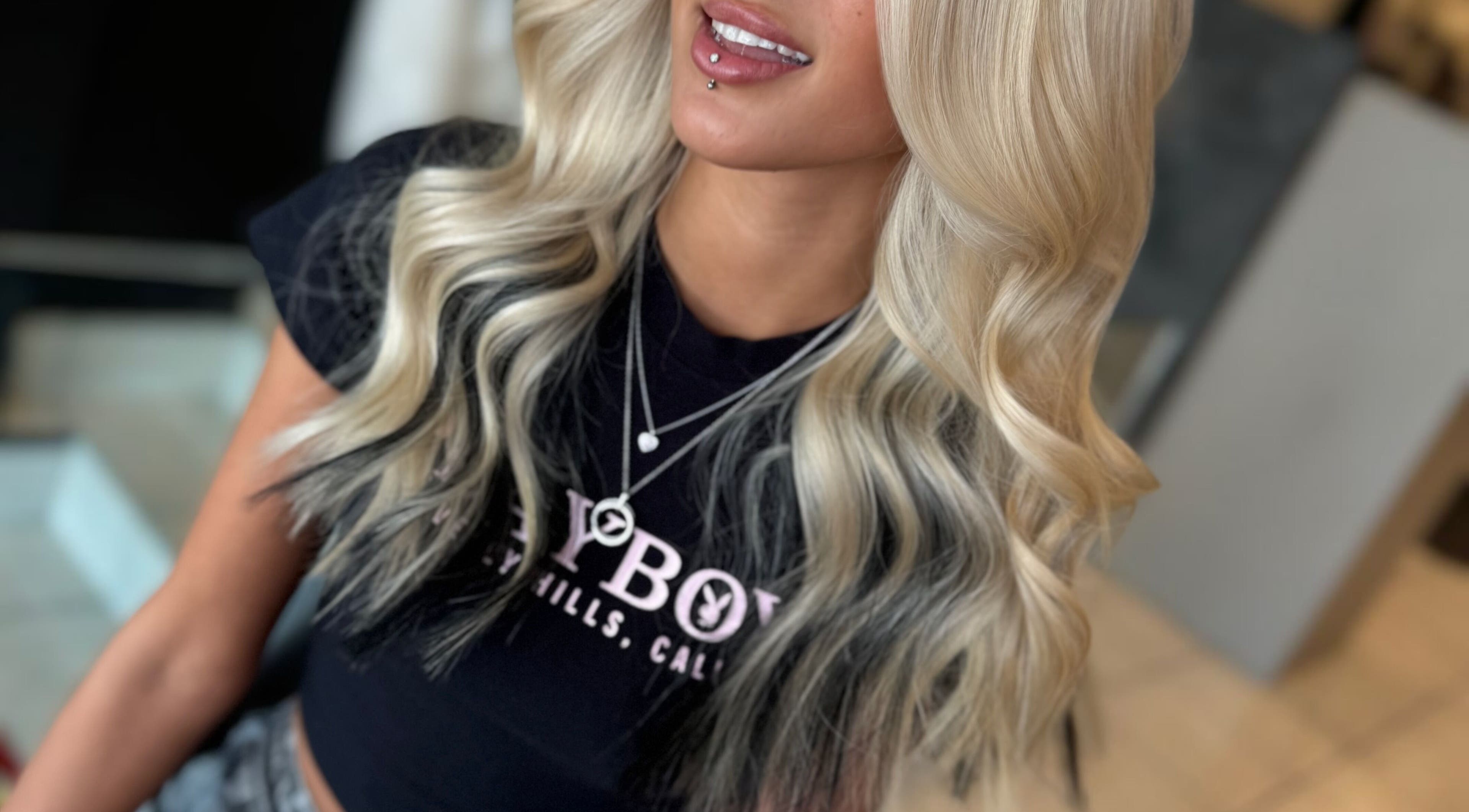 Stylish blonde hair with dark roots at Coiffure in Melbourne, Victoria, AU.