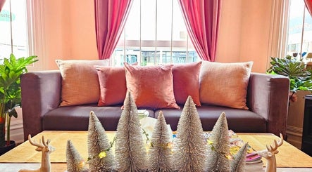 Relax in style at Golden Fingers Thai Massage - Kingsland, Auckland with elegant decor and inviting seating.