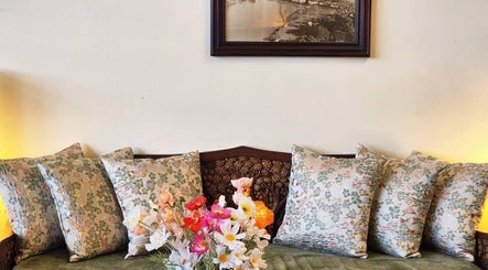 Elegant seating with floral cushions at Golden Fingers Thai Massage - Morningside, Auckland, Auckland, NZ.