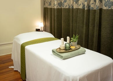 Relaxing massage room at Golden Fingers Thai Massage - Morningside, Auckland, NZ with a serene decor setup.