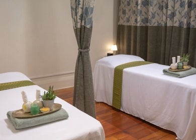 Relaxing massage tables at Golden Fingers Thai Massage - Morningside, Auckland, Auckland, NZ, with elegant decor.