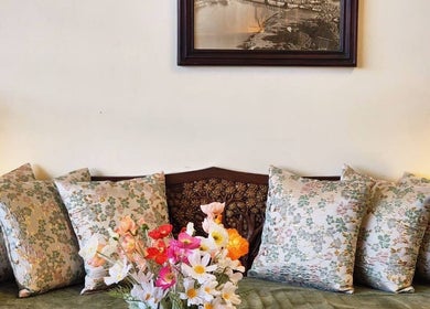Elegant seating with floral cushions at Golden Fingers Thai Massage - Morningside, Auckland, Auckland, NZ.