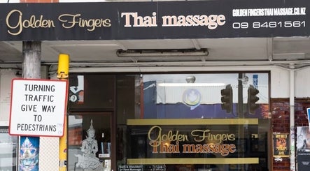 Entrance of Golden Fingers Thai Massage - Morningside, Auckland, NZ showcasing signage and sidewalk view.