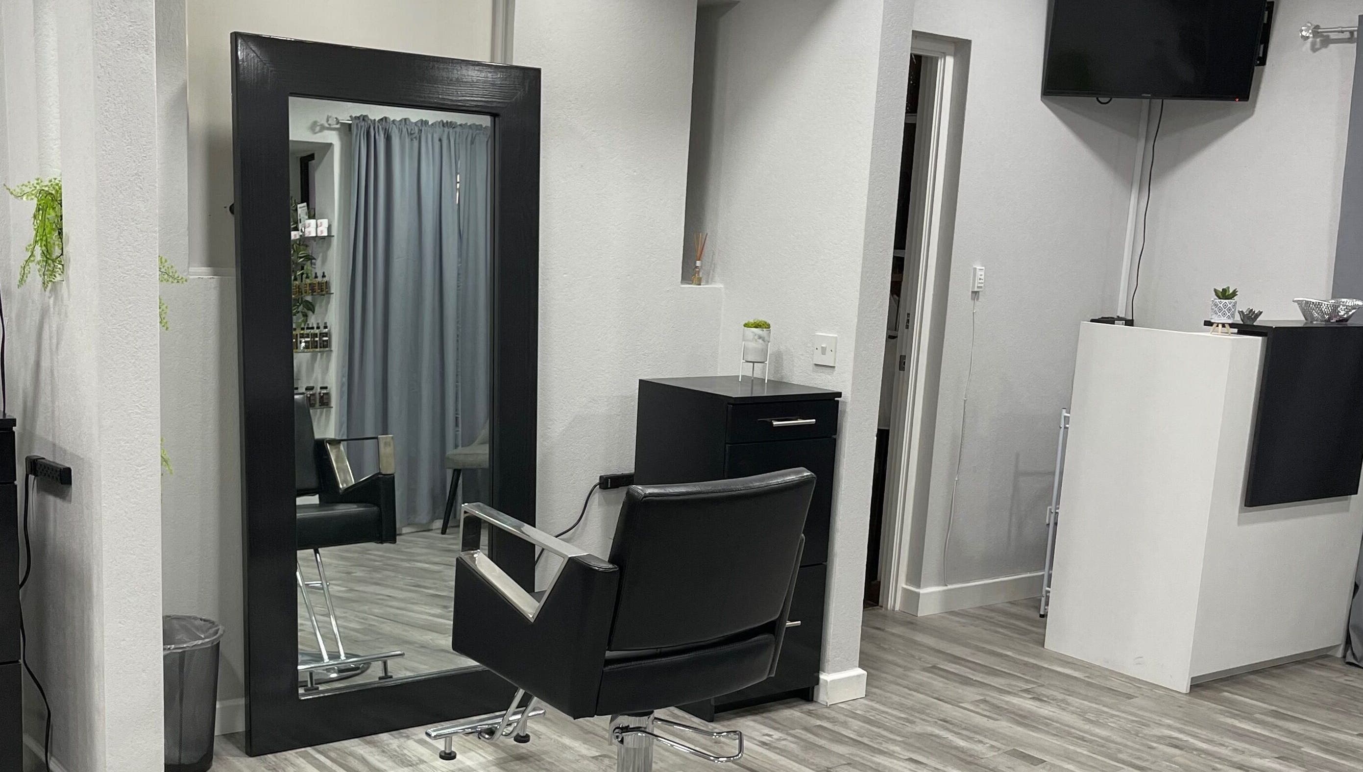 Modern salon chair and mirror at Image by Sha-Nae, Bridgetown, Saint Michael, BB. Sleek decor for a stylish experience.