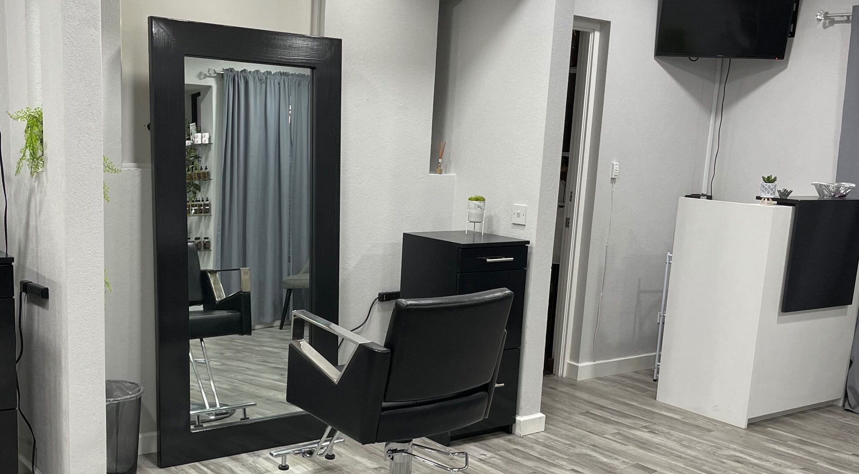 Modern salon chair and mirror at Image by Sha-Nae, Bridgetown, Saint Michael, BB. Sleek decor for a stylish experience.