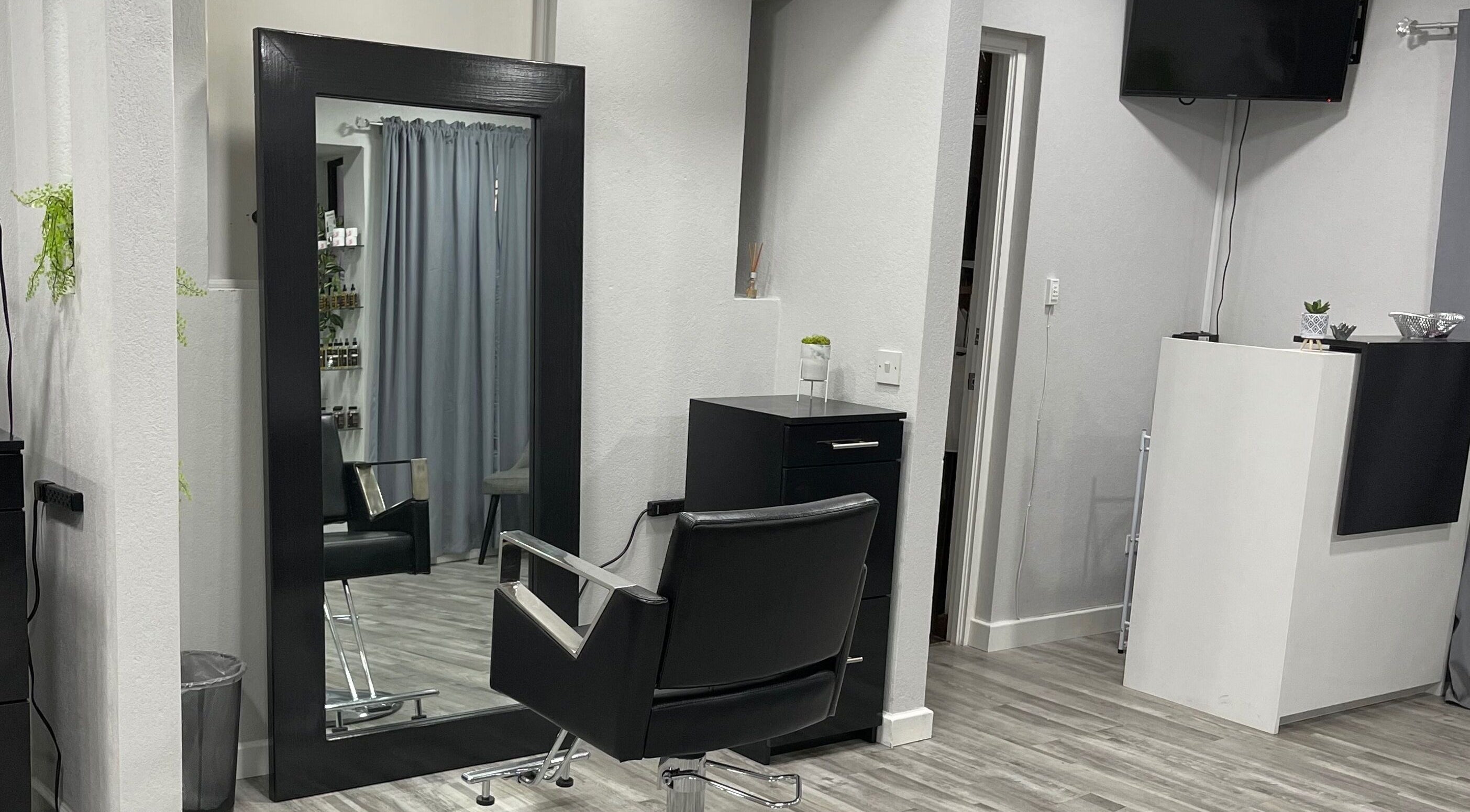 Modern salon chair and mirror at Image by Sha-Nae, Bridgetown, Saint Michael, BB. Sleek decor for a stylish experience.