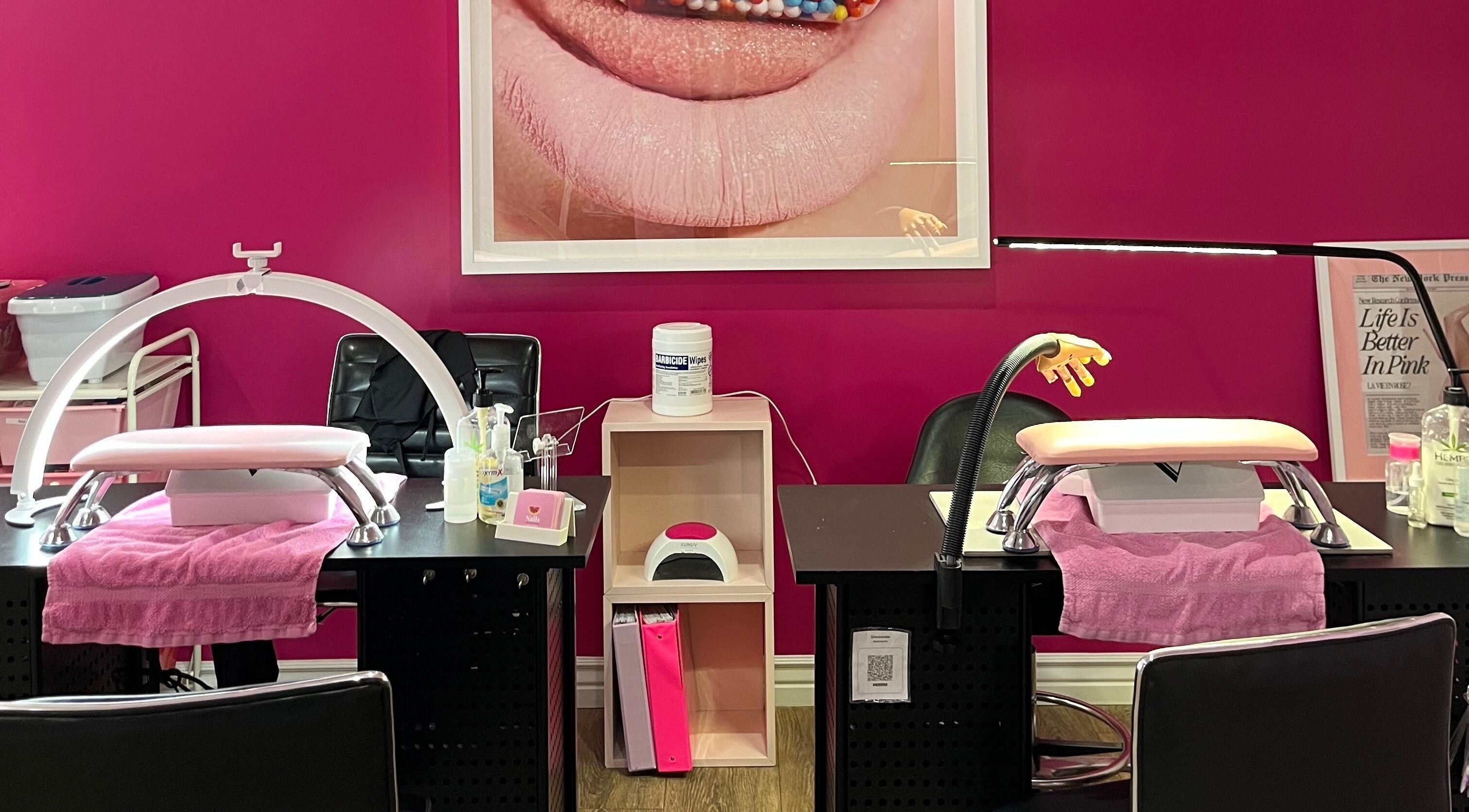 Pinkies Beauty Bar nail station with pink decor in Pleasant Grove, Utah, US.