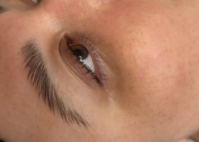 Close-up of a well-groomed eyebrow at Lullaby Wellness, Hamlyn Terrace, New South Wales, AU.