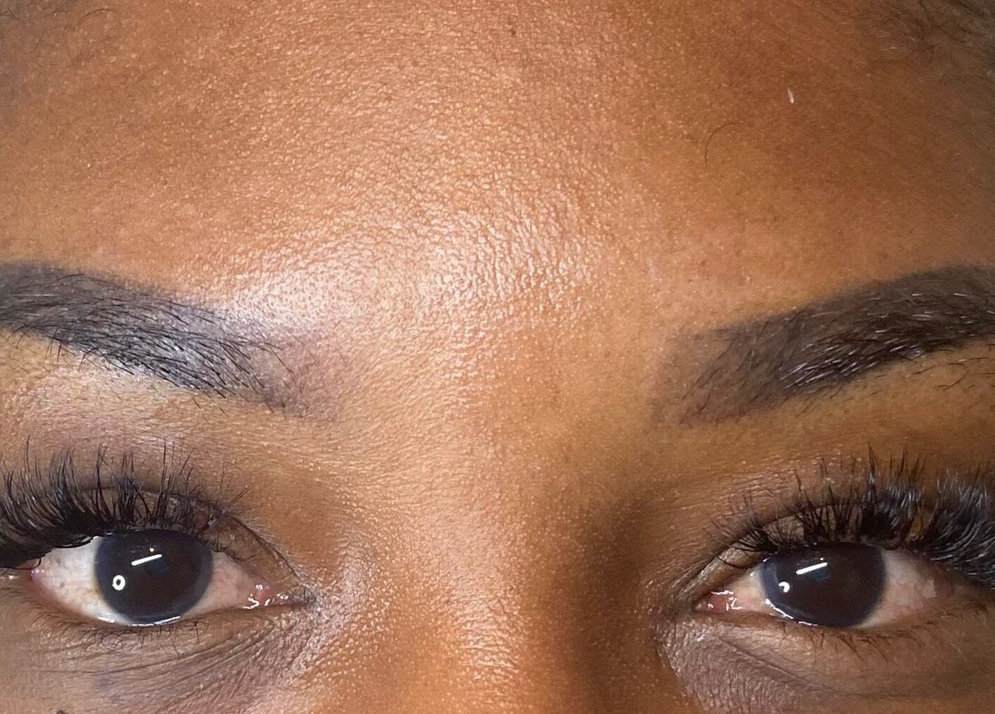 Close-up of professionally styled lashes at Lashes By L’hé, Marigot, MF.