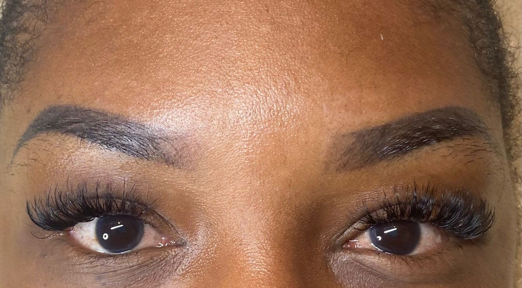 Close-up of professionally styled lashes at Lashes By L’hé, Marigot, MF.