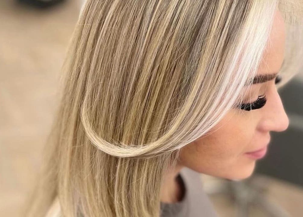 Elegant blonde hair styling at Klass, Swinton, England, GB, showcasing detailed highlights and silky finish.