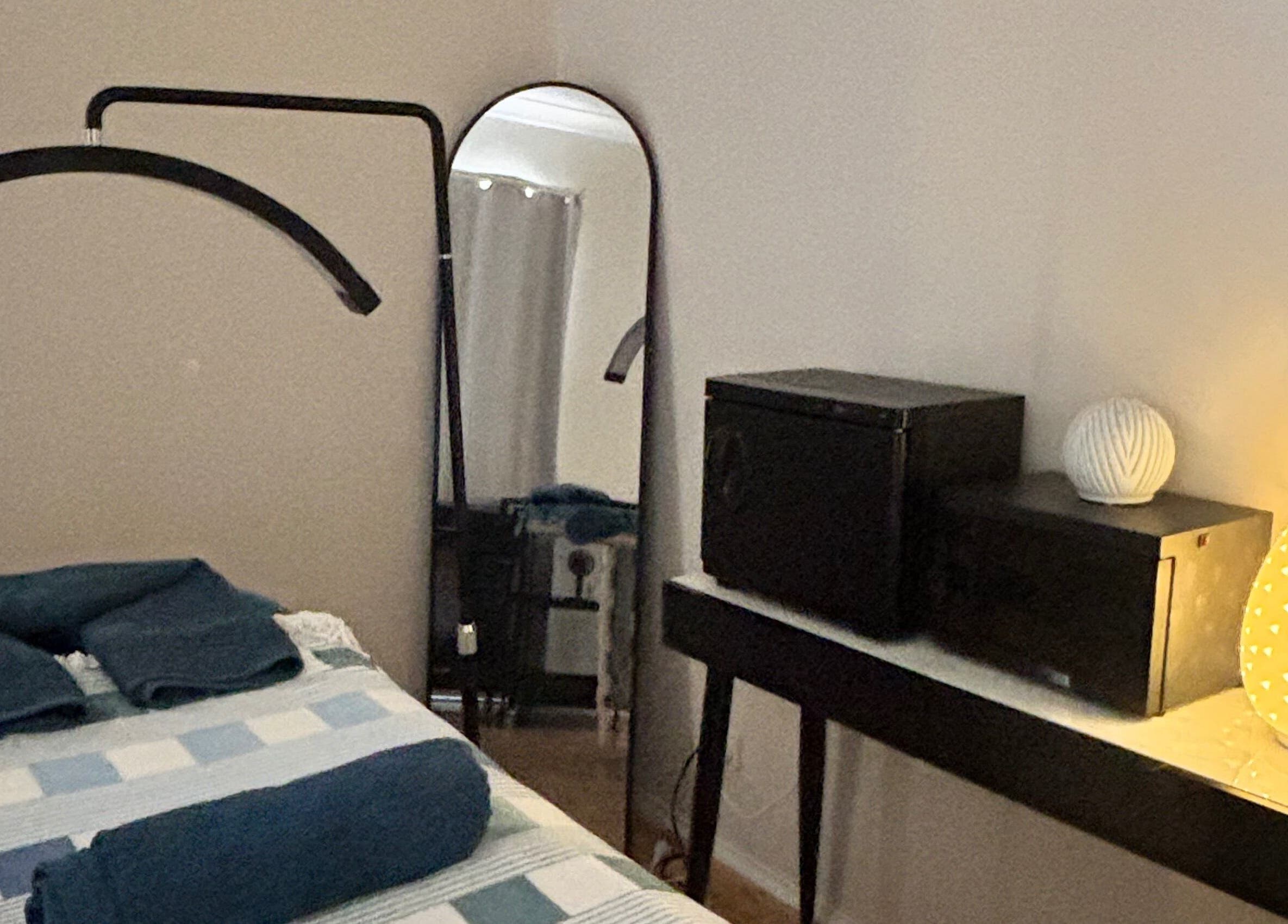 Cozy treatment room at Glow With Elegant Faces, Scarborough, Western Australia, AU with soothing lighting.