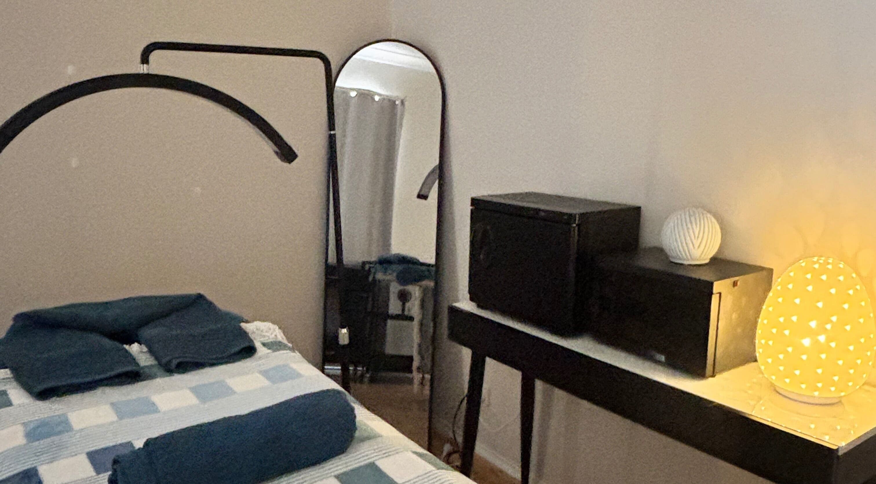 Cozy treatment room at Glow With Elegant Faces, Scarborough, Western Australia, AU with soothing lighting.